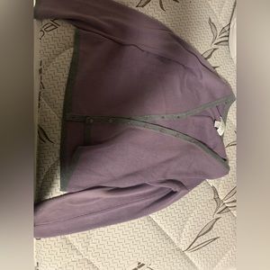 Light purple cardigan with a gray border.